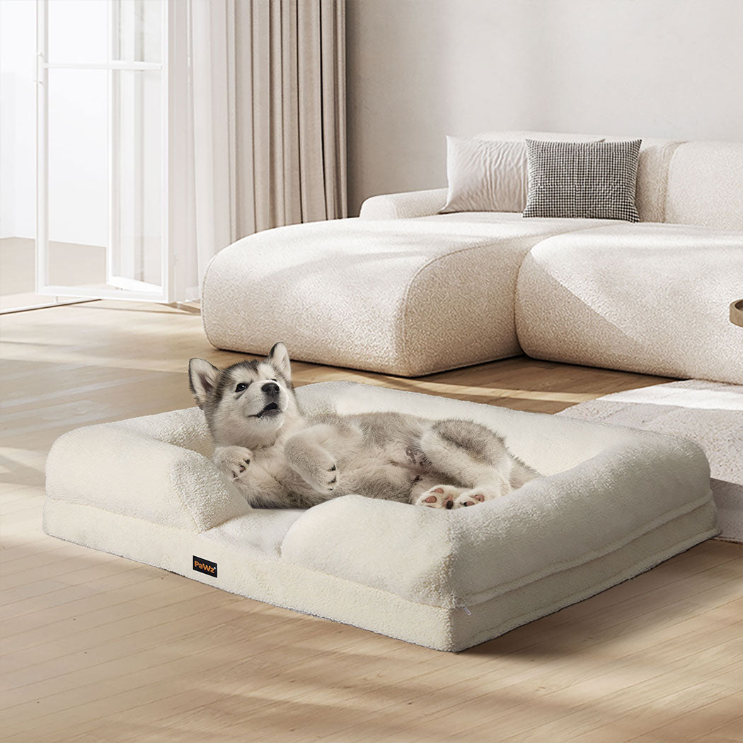 Dog laying back and relaxing on the PaWz OrthoNest in a modern home setting