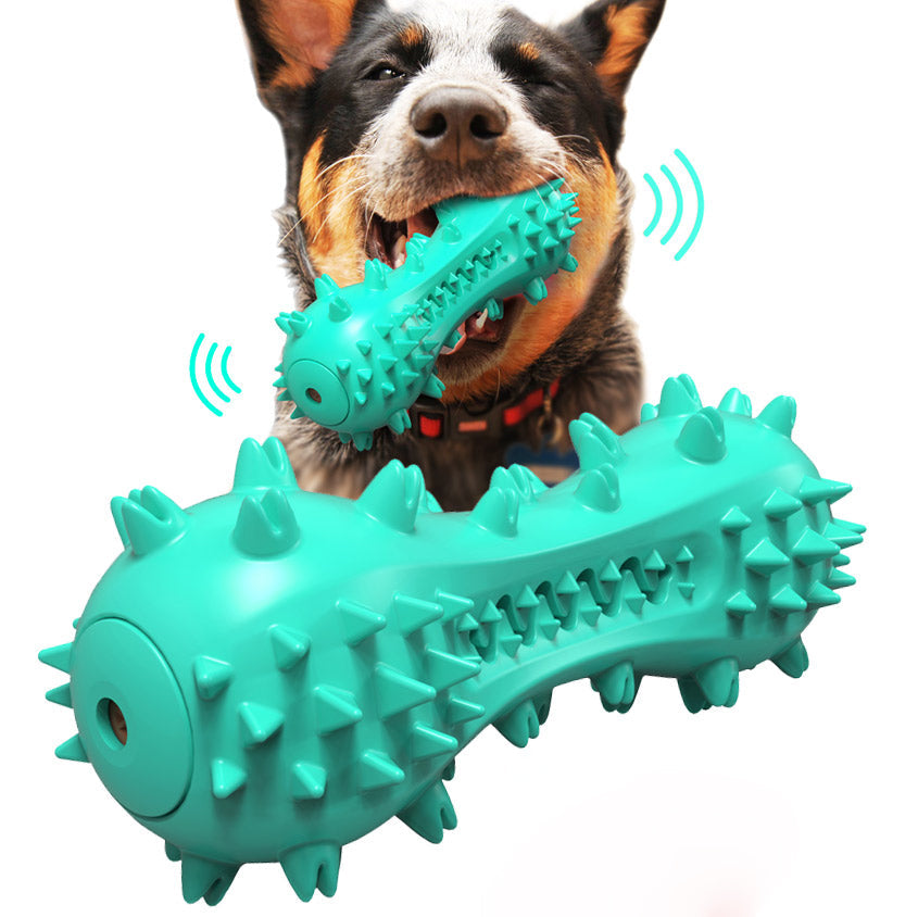 Dog chewing on BiteBright PlayBrush with squeaker – dental chew toy with suction base for interactive play