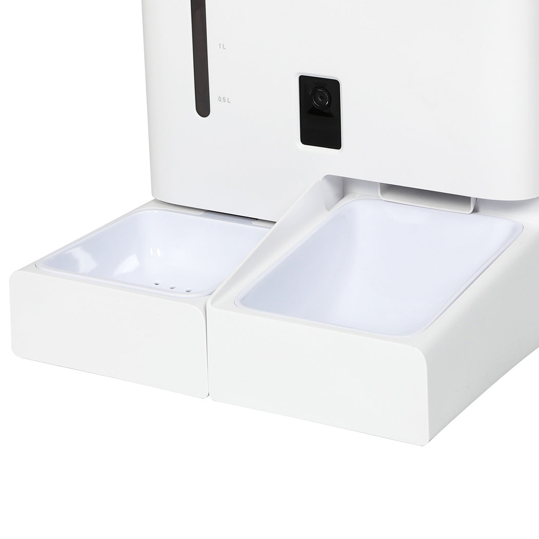 Close-up of dual food and water bowls on PaWz SmartFeast HD Feeder for easy access feeding.