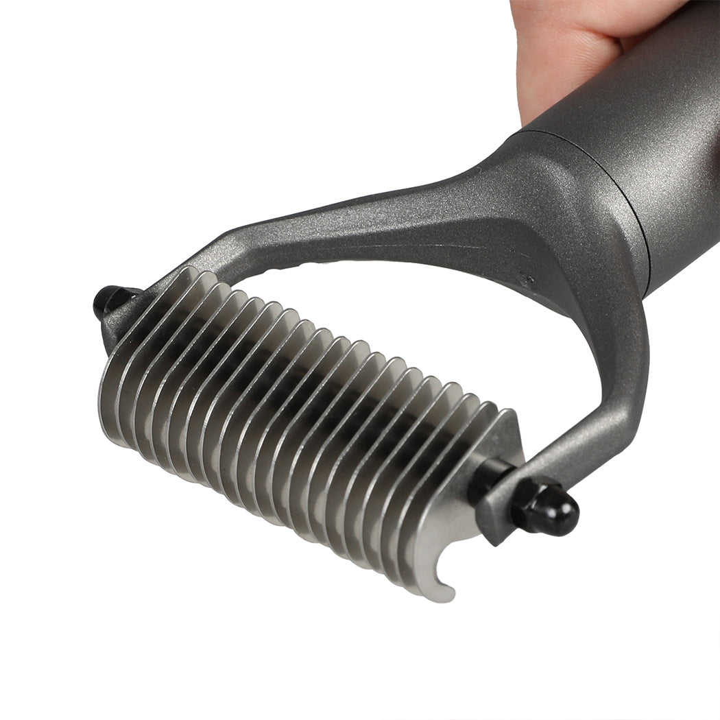 Close-up of one-click cleaning function on PaWz GroomPro grooming handle